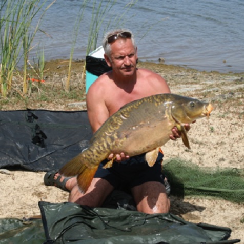 Portuguese carp record holder, Chris Whitman, with a medium size carp